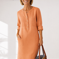 Orange linen-look everyday dress with button placket, three-quarter sleeves, side pockets