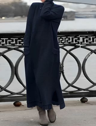 Navy hooded winter maxi dress with long sleeves, front pockets, and side slit
