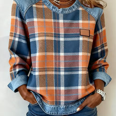 Plaid top with denim-trim neckline, long sleeves, chest patch pocket, orange-blue checks