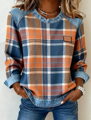 Plaid top with denim-trim neckline, long sleeves, chest patch pocket, orange-blue checks