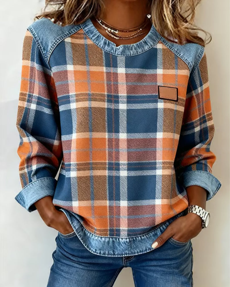 Plaid top with denim-trim neckline, long sleeves, chest patch pocket, orange-blue checks