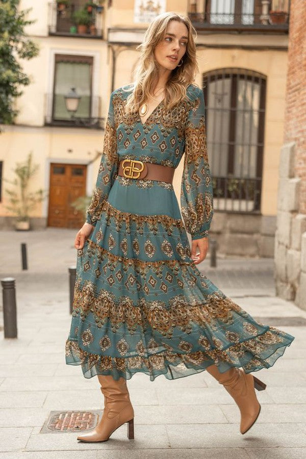 Teal midi dress with gold pattern, V-neck, long sleeves, tiered skirt and belt