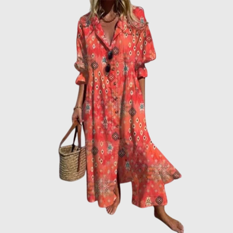 Red bohemian dress with ornate print, V-neck, short sleeves, flared ruffle hem