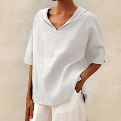Oversized linen shirt in snow white with V-neck and short sleeves
