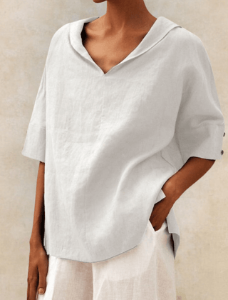Oversized linen shirt in snow white with V-neck and short sleeves
