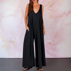 Black wide-leg sleeveless jumpsuit with V-neck and wide flowing legs