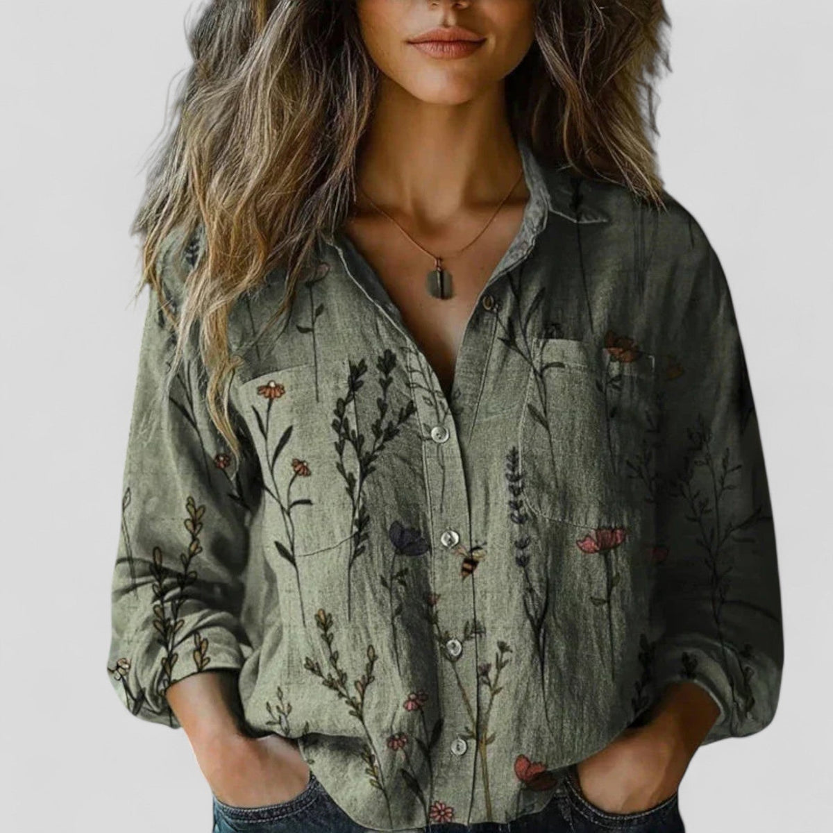 Dark green floral button-up blouse shirt with front buttons and rolled sleeves
