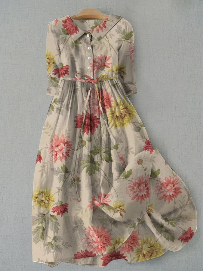 Floral shirt dress with lace-up waist, button front, and three-quarter sleeves