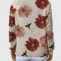 Back view floral knit V-neck cardigan with long sleeves, off-white with red and pink flowers