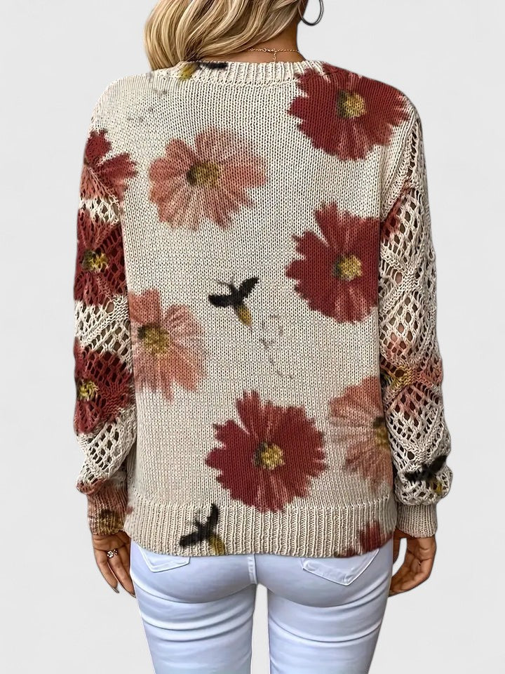 Back view floral knit V-neck cardigan with long sleeves, off-white with red and pink flowers
