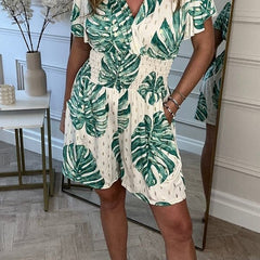 Cream leaf print V-neck short-sleeve dress with tied waist