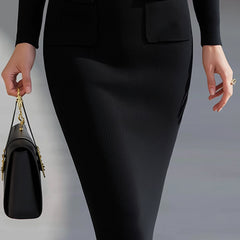 Black ribbed knit midi dress with two chest flap pockets and fitted pencil shape