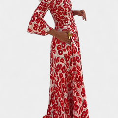 Red off-shoulder maxi dress with long flared sleeves and draped gathered skirt