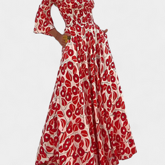 Red off-shoulder maxi dress with long flared sleeves and tiered gathered skirt