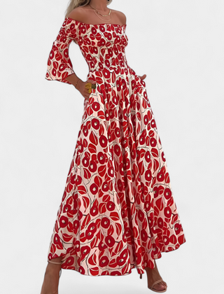 Red off-shoulder maxi dress with long flared sleeves and tiered gathered skirt