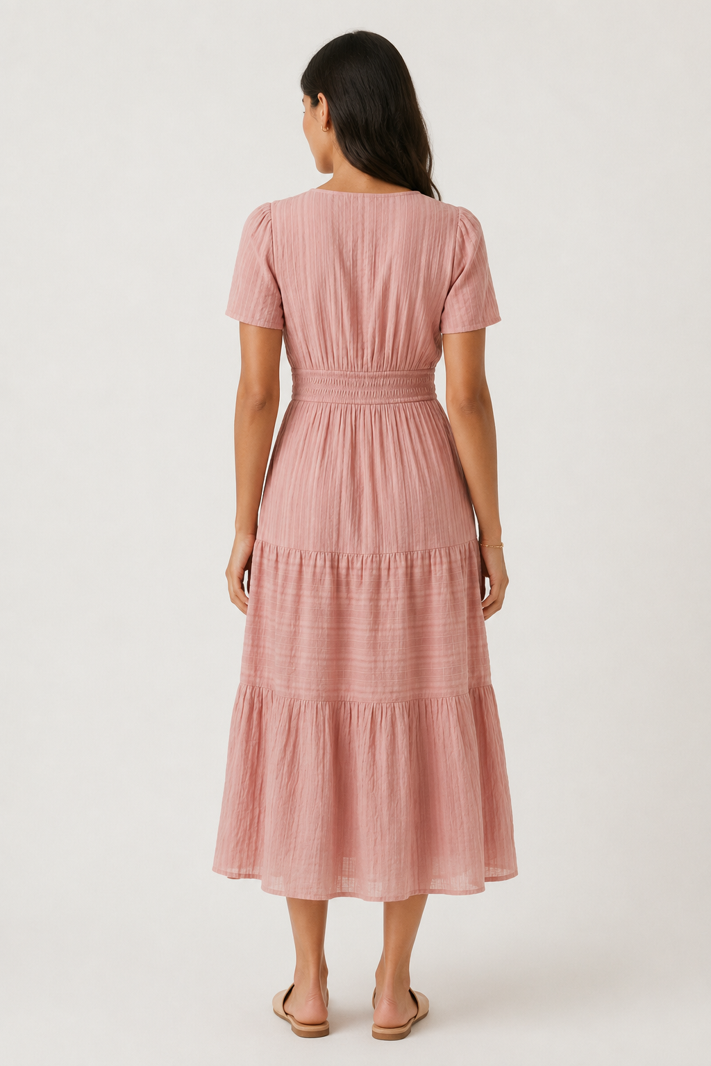 Solene dress, dusty rose pink back view with tiered midi skirt and smocked waist