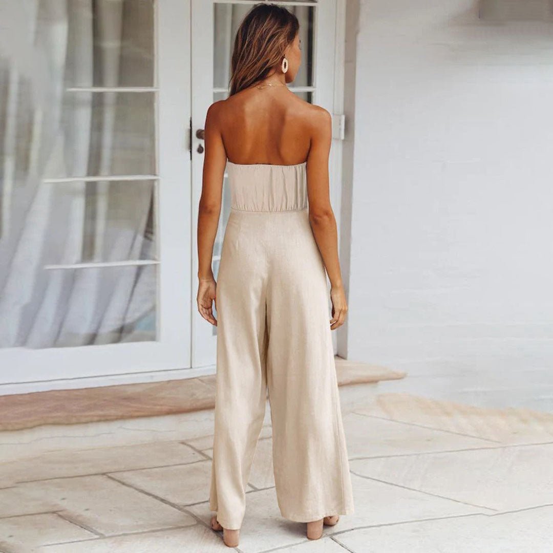 Beige strapless jumpsuit with smocked back and wide-leg pant legs