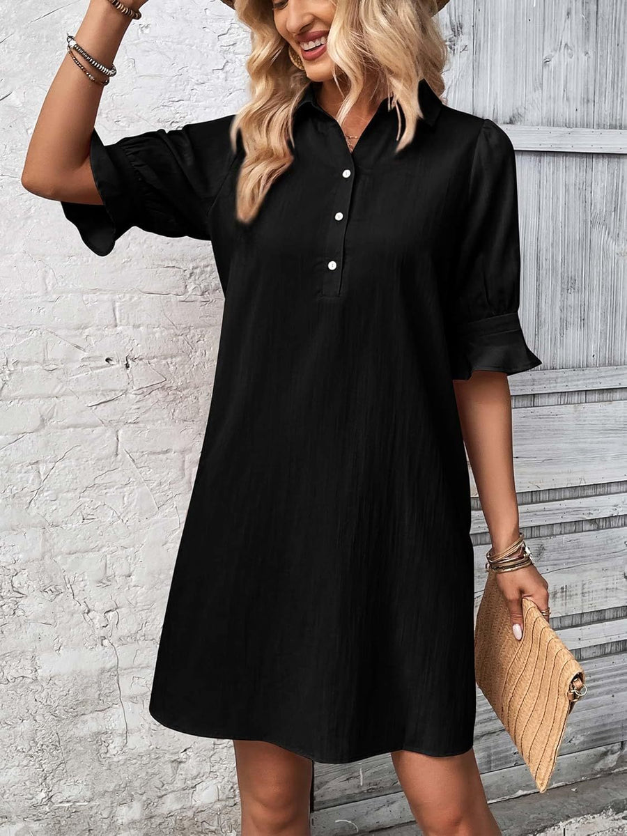 Black button-up shirt dress with pointed collar and flowy ruffled short sleeves