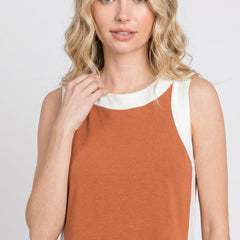 Burnt orange sleeveless tunic dress with white crew neck trim and side panels