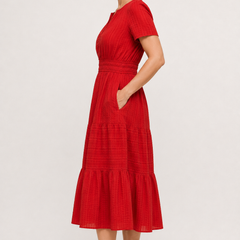 Red tiered midi dress with V-neck short sleeves and gathered waist, side view