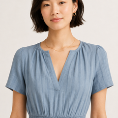 Light blue V-neck short-sleeve dress with elastic waist and textured tiered skirt