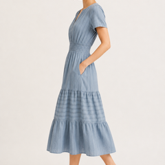 Light blue tiered V-neck midi dress side view with short sleeves and gathered waist