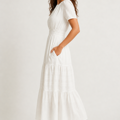 Solene dress side view, white tiered midi skirt with gathered waist and short sleeves
