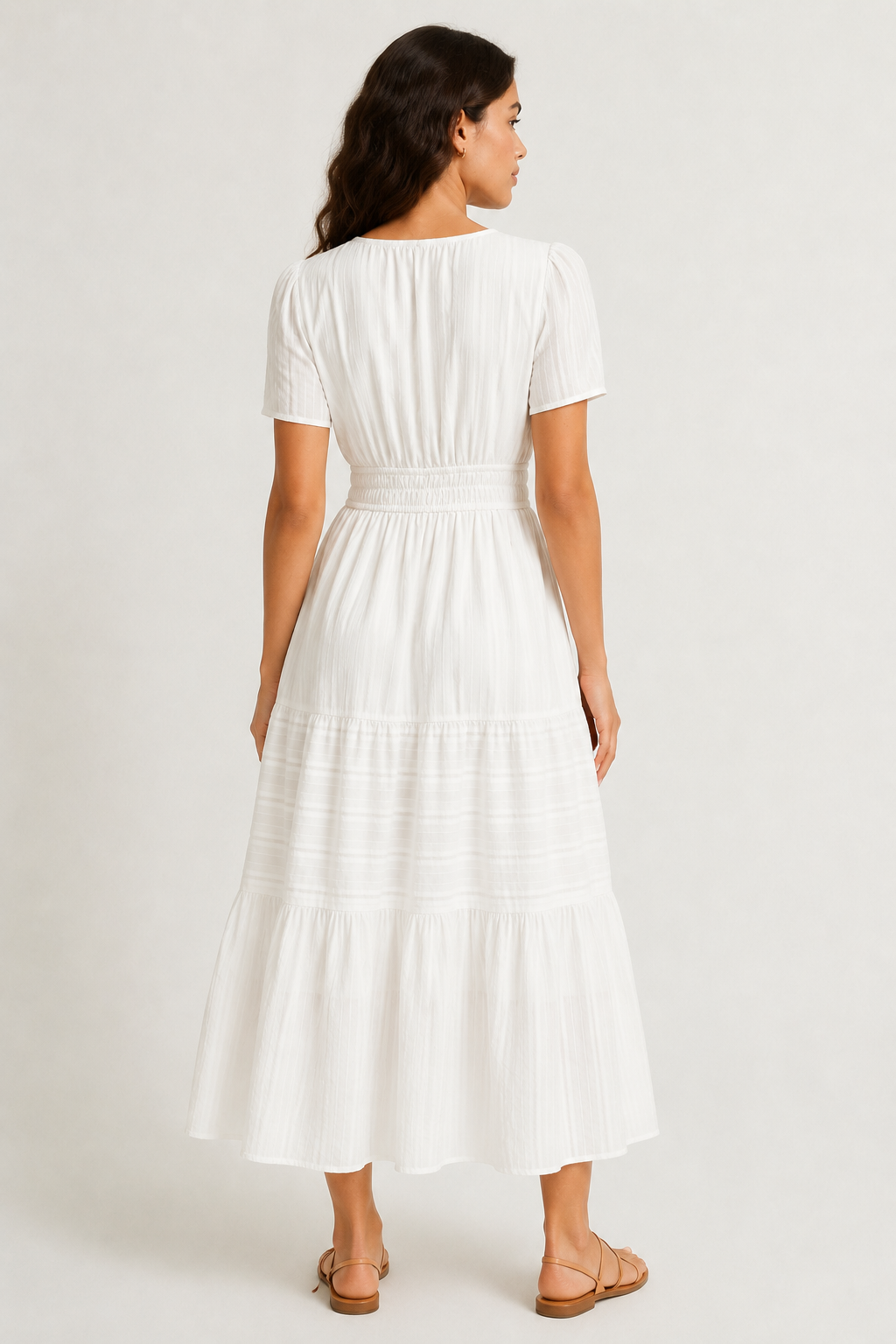 Solene dress back view in white, tiered midi hem with short sleeves and elastic waist