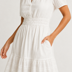 Solene dress waist and skirt detail in white, tiered layers with soft pintuck texture