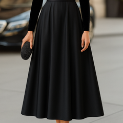 Black midi A-line dress skirt with pleated volume and fitted waist band, long sleeves