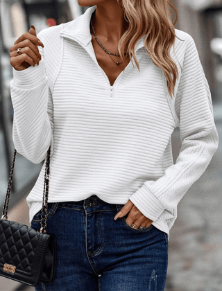 Women's white half-zip knit pullover with stand collar, long sleeves