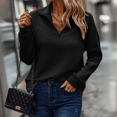 Women's black half-zip knit pullover with half zipper, long sleeves