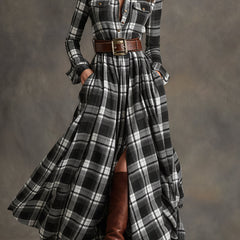 Black-and-white plaid button-up shirt dress with belt, long sleeves, chest pockets