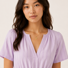 Solene dress in lavender seersucker, V-neck with smocked waist, short sleeves.