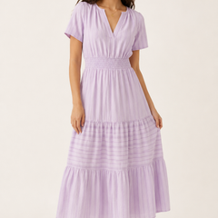 Solene dress in lavender seersucker, V-neck short sleeves, tiered midi skirt.