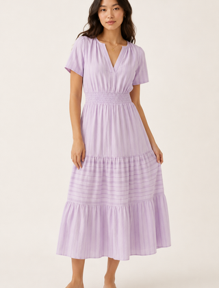 Solene dress in lavender seersucker, V-neck short sleeves, tiered midi skirt.