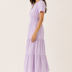 Solene dress in lavender seersucker, V-neck short sleeves, tiered midi skirt.