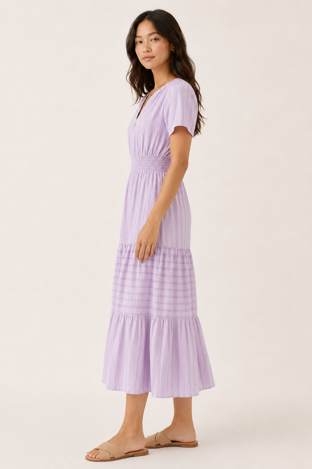 Solene dress in lavender seersucker, V-neck short sleeves, tiered midi skirt.