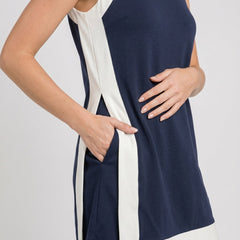 Sleeveless navy game day dress with white trim and side panel cutout