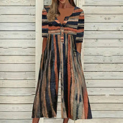 Multicolor striped jumpsuit with V-neck button front, short sleeves, and flowy wide legs