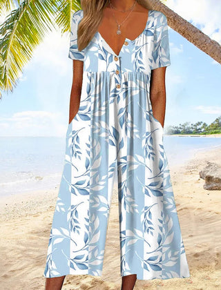 Light blue floral-print jumpsuit with V-neck button front, ruffle cap sleeves, wide legs