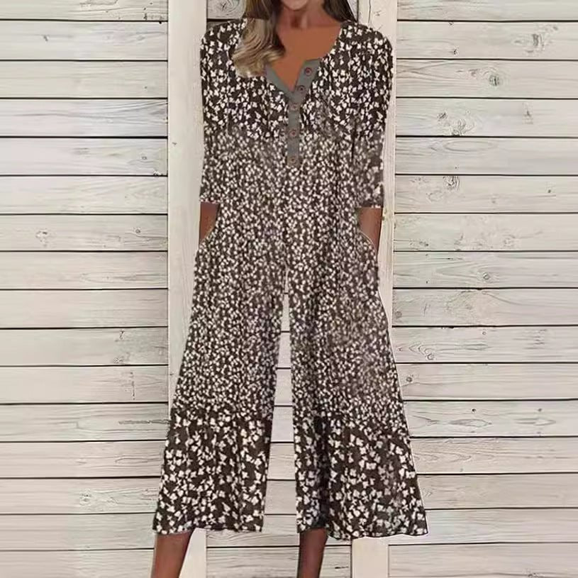 Brown and black ditsy floral jumpsuit with V-neck button front, short sleeves, wide legs