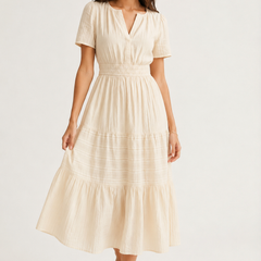 Solene dress in light cream, V-neck, short sleeves, tiered midi skirt and gathered waist