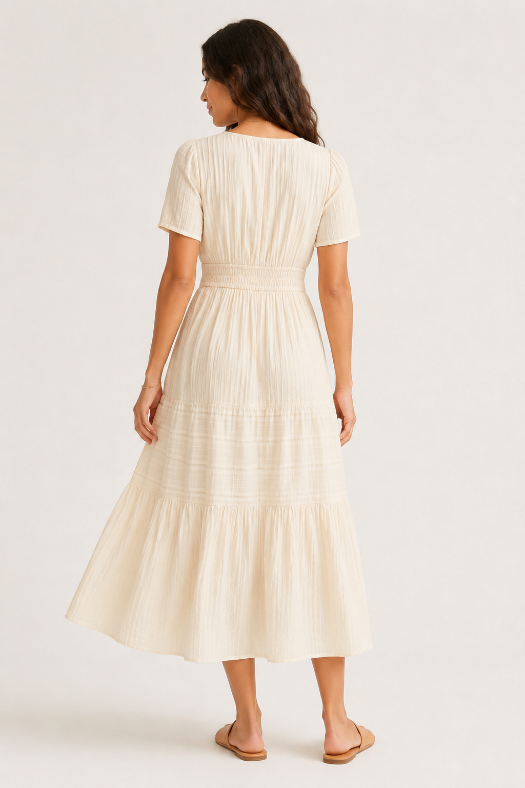 Solene dress back view in light cream, tiered midi skirt, short sleeves, elastic waist