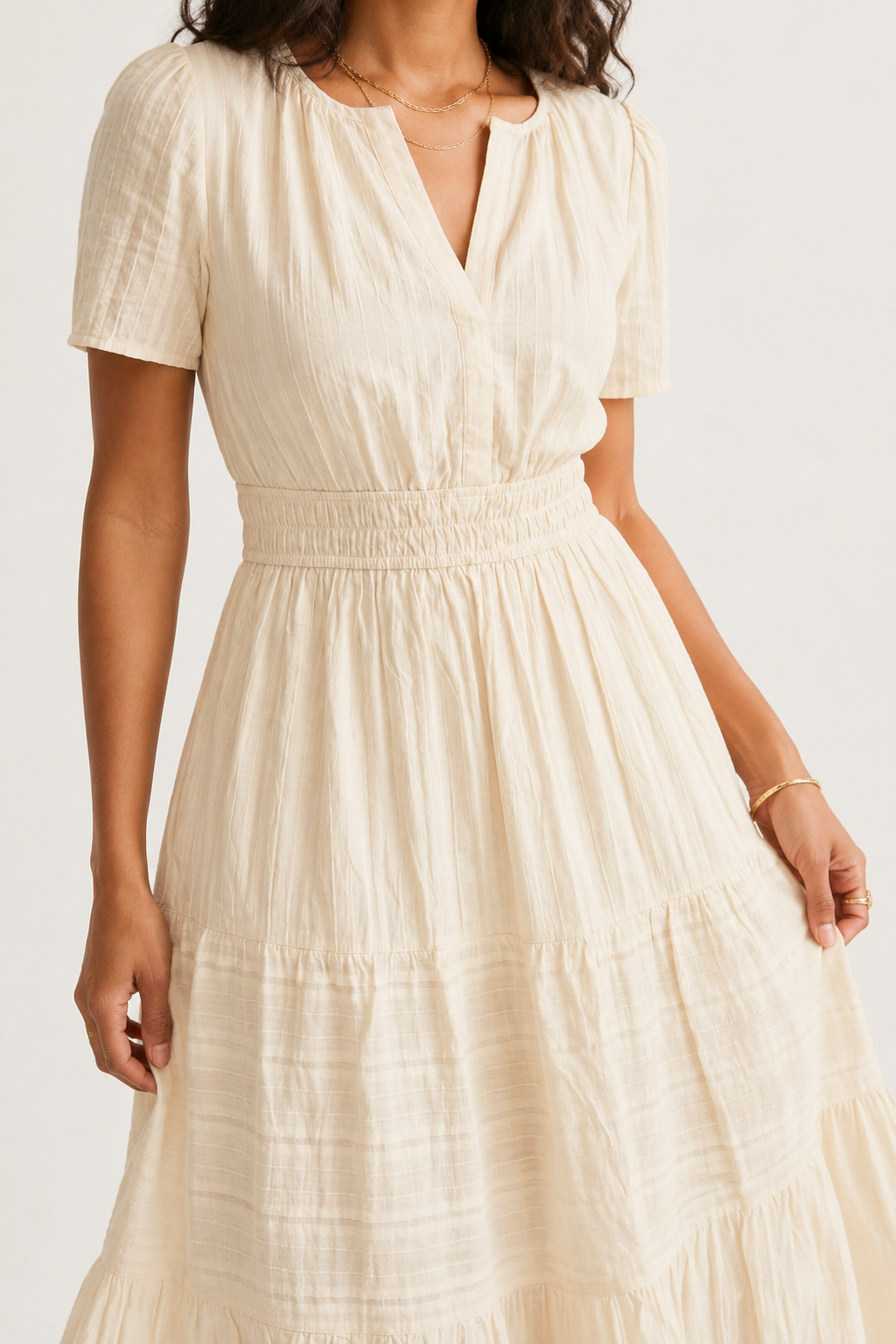Solene dress bodice and skirt detail in light cream, tiered ruffles with gathered waist