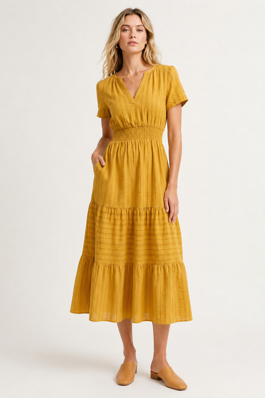 Mustard yellow tiered midi dress with V-neck and short sleeves, gathered waist