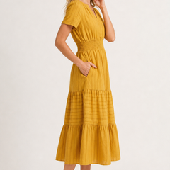 Mustard yellow V-neck tiered midi dress with short sleeves and gathered waist