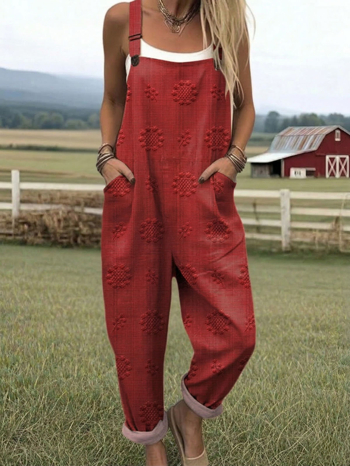 Red relaxed jumpsuit with embroidered floral pattern, wide-leg bib overalls