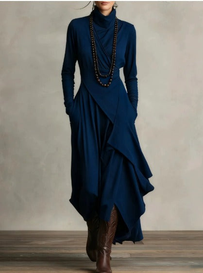 Blue asymmetrical maxi knit dress with roll neck and draped long sleeves