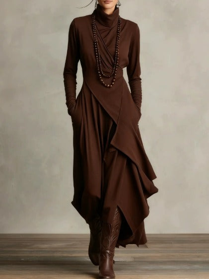 Brown asymmetrical maxi knit dress with roll neck and draped wrap front, long sleeves